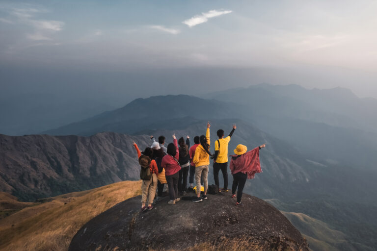 hiking-travellers-group-colorful-shirts-standing-middle-golden-meadow-mountain-biew-pointing-your-finger-their-own-destination-mulayit-taung-myanmar